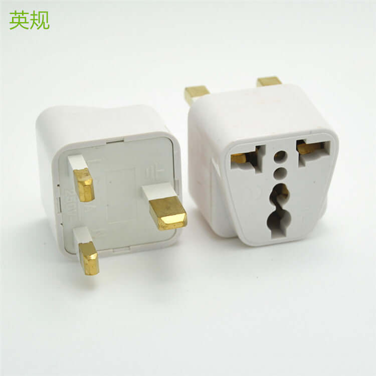 Two white three-prong electrical adapters with gold connectors displayed on a white background.